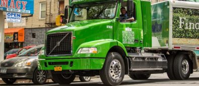 A Man Riding Green Truck