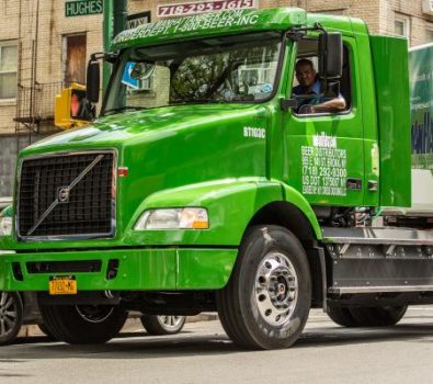 A Man Riding Green Truck